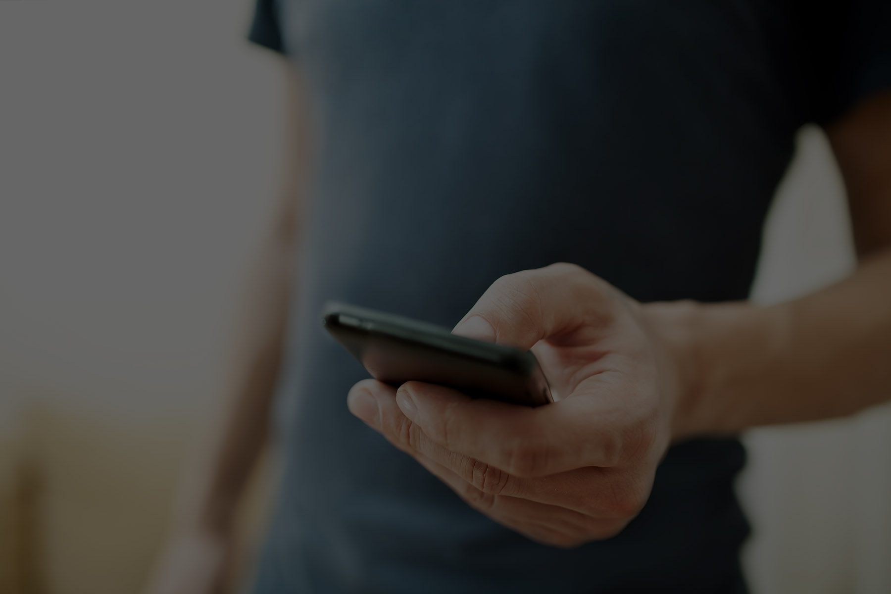 Close-up of person holding smartphone